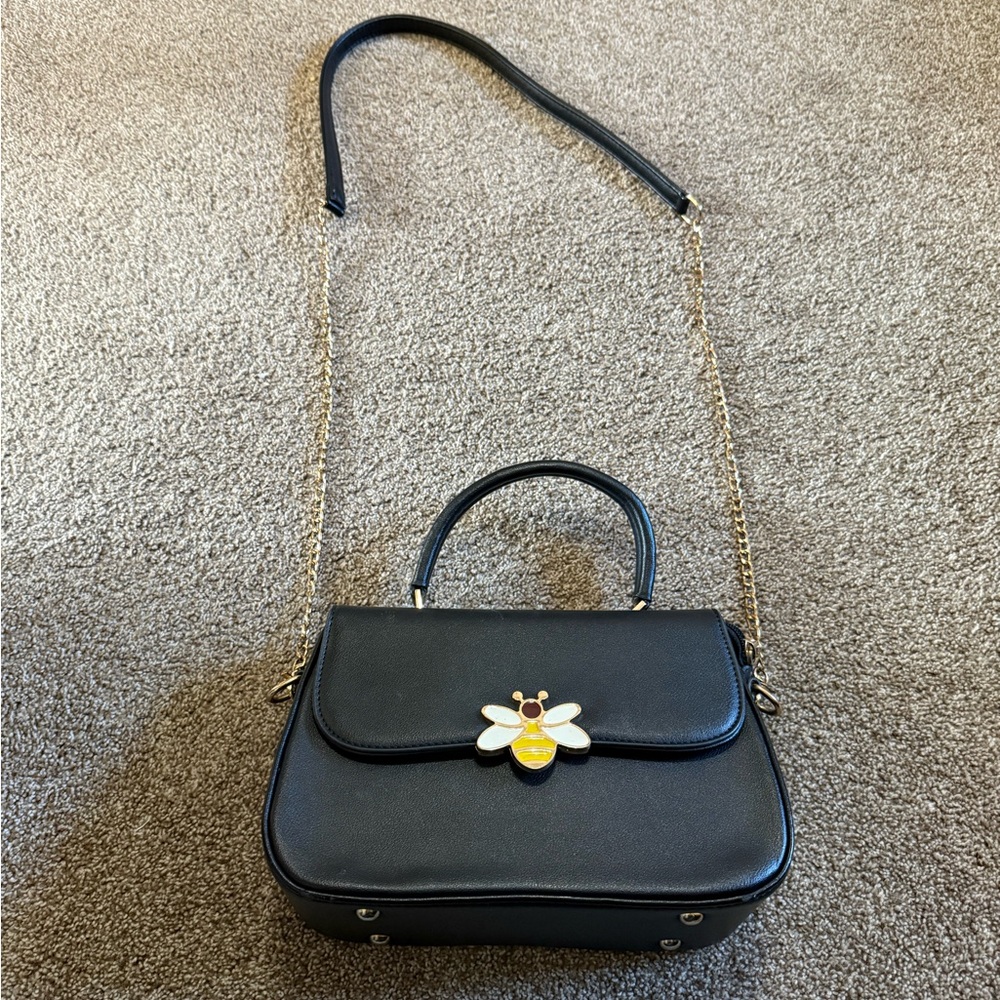 Black Leather Handbag with Gold Chain and Bee Accent